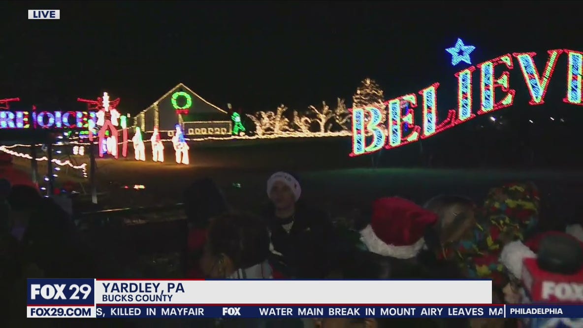 Visitors enjoy Shady Brook Farms dazzling Christmas lights display